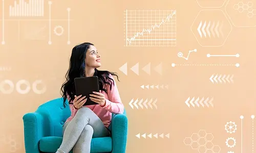 Smiling woman holding a tablet device  Smiling woman holding a tablet device
